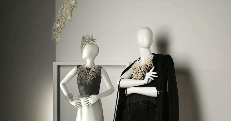 two mannequins with varying light